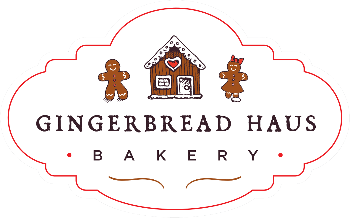 Logo of Gingerbread Haus Bakery, featuring a whimsical, hand-drawn gingerbread house centered within a cloud-like frame with a red outline. To the left of the house is a smiling gingerbread man, and to the right is a gingerbread woman with a bow. Above the house, 'GINGERBREAD HAUS' is written in a playful, serif font, and below, the word 'BAKERY' curves gently with a decorative swirl underneath.