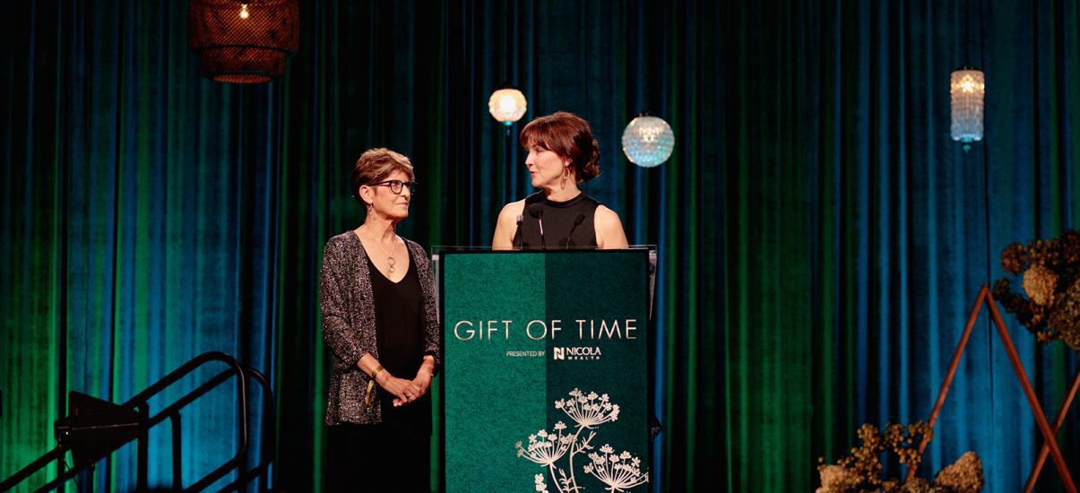 Canuck Place nurses speaking at the Gift of Time gala, standing at the podium