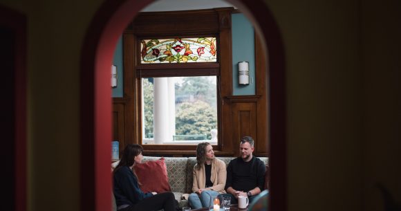 Derek and Rebecca Van Oosterom speak with Canuck Place Counsellor Natasha Zacher.